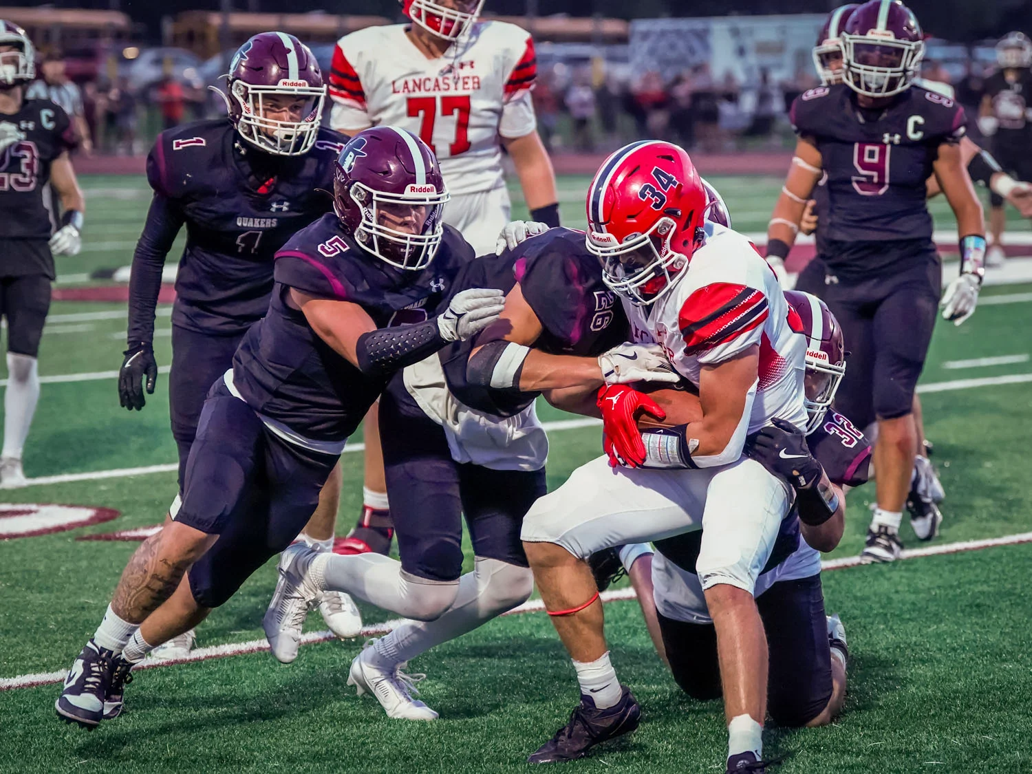 Gang tackle against a Lancaster RB