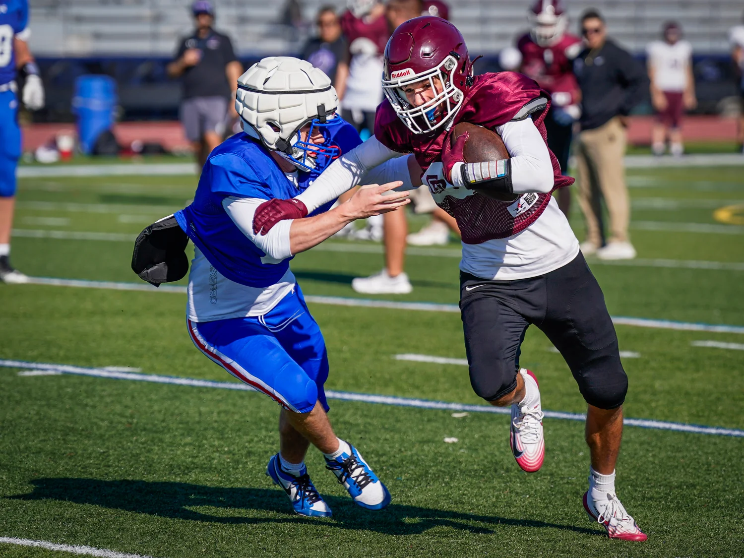 Ball carrier shaking off the defender